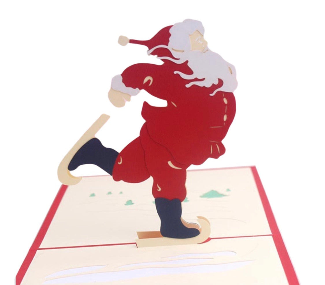 Santa on Skates Pop-Up Card - Clé de Coeur