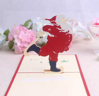 Santa on Skates Pop-Up Card - Clé de Coeur